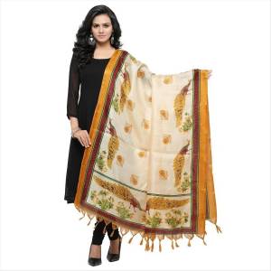 Dupatta Adds Beauty To Any Kind Of Suit, Be It Simple Or Heavy. Grab This Dupatta In White And Yellow Color Fabricated On Cotton Art Silk Beautified With Various Multiple Prints. 