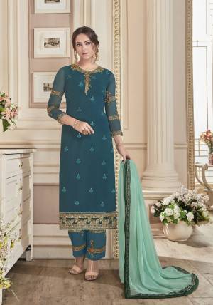 New And Unique Shades In Blue Are Here With This Semi-Stitched Suit In Teal Blue Colored Top Paired With Teal Blue Colored Bottom And Aqua Blue Colored Dupatta. Its Top Is Fabricated On Georgette Paired With Santoon Bottom And Chiffon Dupatta. This Suit Is Light Weight And Easy To Carry All Day Long.