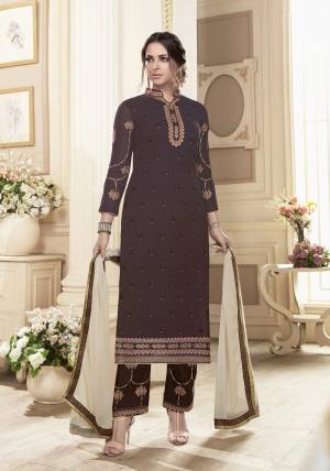 Enhance Your Personality Wearing This Designer Straight Suit In Brown Colored Top Paired With Brown Colored Bottom And Cream Colored Dupatta. Its Top Is Fabricated On Georgette Paired With Santoon Bottom And Chiffon Dupatta. Its all Three Fabrics Ensures Superb Comfort All Day Long. 
