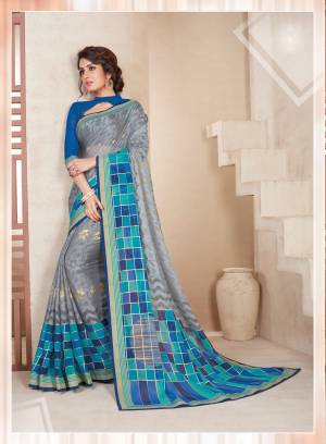Grab This Saree With A Very Lovely Combination In Grey And Blue Color Paired With Blue Colored Blouse. This Saree Is Fabricated On Chiffon Brasso Paired With Art Silk Fabricated Blouse. This Saree Is Durable And Light In Weight To Carry All Day Long.