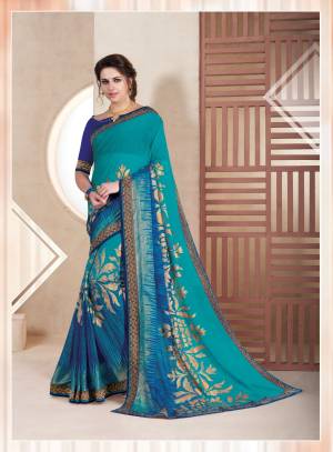 Add This Pretty Blue Colored Saree To Your Wardrobe Paired With Dark Blue Colored Blouse. This Saree Is Fabricated On Chiffon Brasso Paired With Art Silk fabricated Blouse. It Is Light In Weight And Ensures Superb Comfort All Day Long.