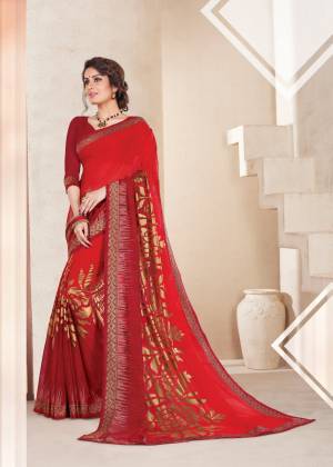 Adorn The Angelic Look Wearing This Saree In Red Color Paired With Maroon Colored Blouse, This Saree Is Fabricated On Chiffon Brasso Paired With Art Silk Fabricated Blouse. Buy This Attractive Saree Now.