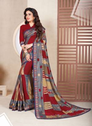For Your Semi-Casual Wear, Grab This Saree In Grey And Maroon Color Paired With Maroon Colored Blouse. This Saree Is Fabricated On Chiffon Brasso Paired With Art Silk Fabricated Blouse. This Saree Is Light Weight And Easy to Carry all Day Long.