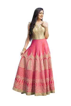 Look Beautiful Wearing this Designer Readymade Gown In Pink And Beige Color Fabricated On art Silk Beautified With Thread Embroidery And Stone Work. 