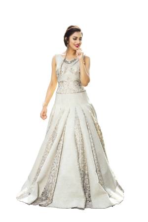 Grab This Pretty Elegant Looking Readymade Gown In Off-White Color Based On Imported Fabric. This Pretty Gown Is Beautified with Sequence Work.  Buy Now.