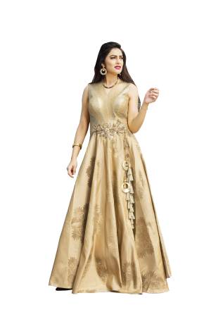 Another Elegant Looking Party Wear Designer Readymade Gown Is Here In Beige Color Fabricated On Imported Fabric and Art Silk. This Gown Is Light Weight And ensures Superb Comfort All Day Long.