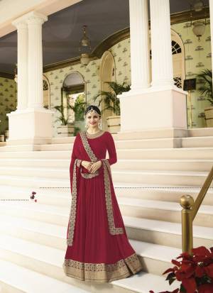 Enhance Your Personality Wearing This Rich And Royal Looking Designer Floor Length Suit In Maroon Colored Top Paired With Maroon Colored Bottom And Dupatta. Its Top Is Fabricated On Georgette Paired With Santoon Bottom And Chiffon Dupatta. This Heavy Designer Suit Will Earn You Lots Of Compliments From Onlookers. Buy Now.