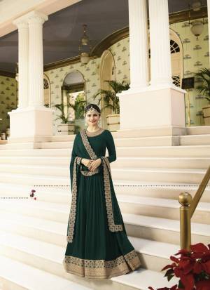 Enhance Your Personality Wearing This Rich And Royal Looking Designer Floor Length Suit In Forest Green Colored Top Paired With Forest Green Colored Bottom And Dupatta. Its Top Is Fabricated On Georgette Paired With Santoon Bottom And Chiffon Dupatta. This Heavy Designer Suit Will Earn You Lots Of Compliments From Onlookers. Buy Now.