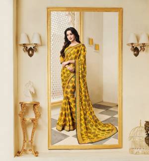 Celebrate Ths Festive Season Wearing This Saree In Yellow Color Paired With Yellow Colored Blouse. This Saree Is Fabricated On Silk Georgette Paired With Art Silk Fabricated Blouse. It Is Light Weight And Easy To Carry All Day Long.