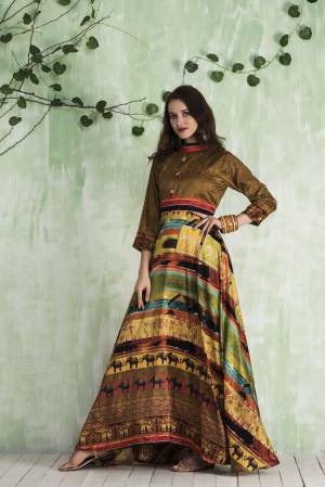 Here Is Pretty Readymade Floor Length Gown In Brown And Multi Color Fabricated On Tussar Art Silk Beautified With Prints All Over It. Its Fabric Is Soft Towards Skin And Easy To Carry All Day Long.