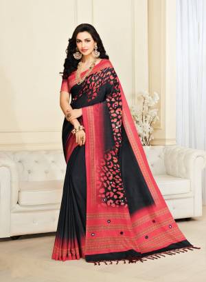 For A Bold And Beautiful Look, Grab This Saree In Black And Pink Color Paired With Pink Colored Blouse. This Saree And Blouse Are Fabricated On Jute Silk Beautified With Prints And Mirror Work. Buy Now.
