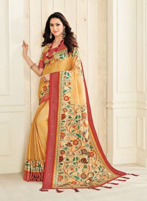 Celebrate This Festive Season With Beauty And Comfort Wearing This Saree In Yellow Color Paired With Yellow Colored Blouse. This Saree And Blouse Are Fabricated On Jute Silk Beautified With Multi Colored Floral Prints. 