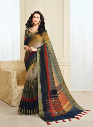 Enhance Your Beauty In This Lovely Beige And Black Colored Saree Paired With Beige And Black Colored blouse. This Saree And Blouse Are Fabricated On Jute Silk Beautified With Prints, Mirror Work And Tassels.