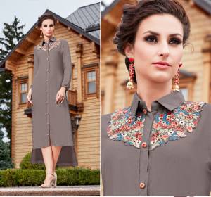 Rich And Elegant Looking Designer Readymade Kurti Is Here In Grey Color Fabricated On Georgette. Its Is Beautified With Attractive Multi Colored Embroidery Over The Front Neck. Buy Now.