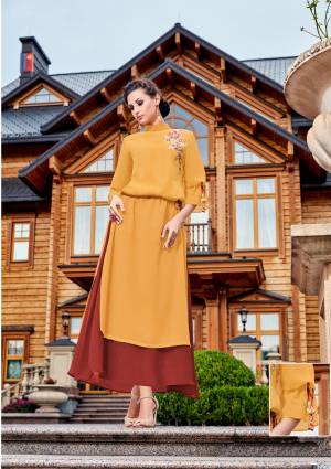 Celebrate This Festive Season With Beauty And Comfort Wearing This Designer Readymade Kurti In Yellow And Maroon Color Fabricated On Georgette Beautified With Thread Work. Buy This Kurti Now.