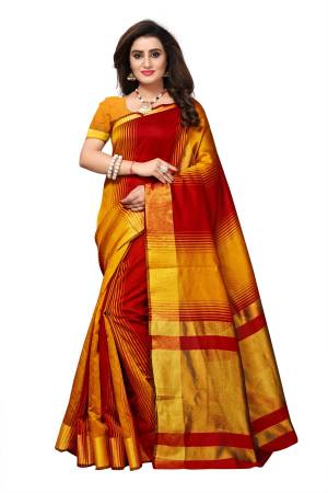 Adorn The Lovely Angelic Look Wearing This Lovely Saree In Red And Yellow Color Paired With Yellow Colored Blouse. This Saree And Blouse Are Fabricated On Cotton Silk Which Is Light Weight And Easy To Carry All Day Long.
