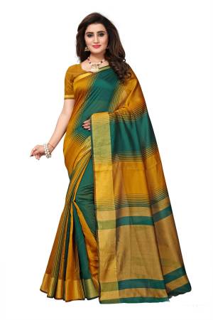 Simple And Elegant Looking Saree Is Here In Green And Musturd Yellow Color Paired With Musturd Yellow Colored Blouse. This Saree And Blouse Are Fabricated On Cotton Silk. Its Fabric Ensures Superb Comfort All Day Long. Buy Now.