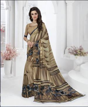 Simple And Elegant Looking Color Is Here With This This Saree In Beige Color Paired With Beige Colored Blouse. This Saree And Blouse Are Fabricated On Georgette Beautified With Prints. It Is Light Weight And Easy To Carry All Day Long.