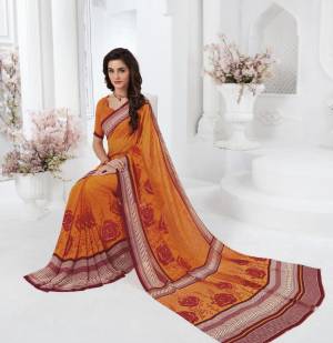 Orange Color Induces Perfect Summery Appeal To Any Outfit, So Grab This Simple Saree For Your Casual Wear In Orange Color paired With Orange Colored blouse. This Saree And Blouse Are Fabricated On Georgette Beautified With Contrasting Prints.