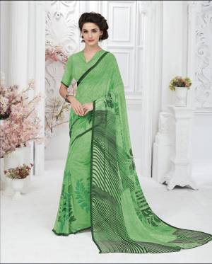 Look Pretty In This Light Green Colored Saree Paired With Light Green Colored Blouse. This Saree And Blouse Are Fabricated On Georgette. Its Pretty Light Color And Fabric Ensures Superb Comfort All Day Long.
