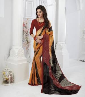 Go Colorful With This Saree In Multi Color Paired With Red Colored Blouse. This Saree And Blouse Are Fabricated On Georgette Beautified With prints. It Is Light In Weight And Easy To Carry All Day Long.