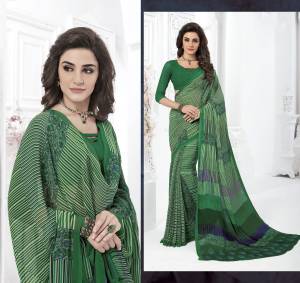 Grab This Simple Saree For Your Casual Wear In Green Color Paired With Green Colored Blouse. This Saree And Blouse Are Fabricated On Georgette Beautified With Prints All Over It, Buy This Saree Now.