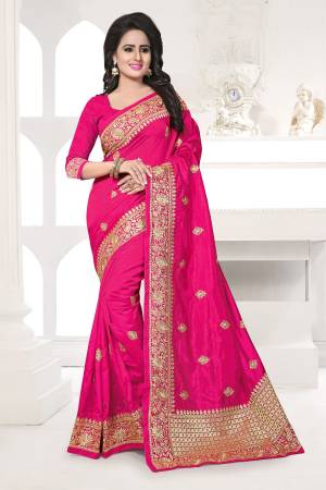 Bright And Visually Appealing Color Is Here With This Designer Saree In Dark Pink Color Paired With Dark Pink Colored Blouse. This Saree And Blouse Are Fabricated On Art Silk Beautified With Jari Embroidery Work. Buy This Saree Now.