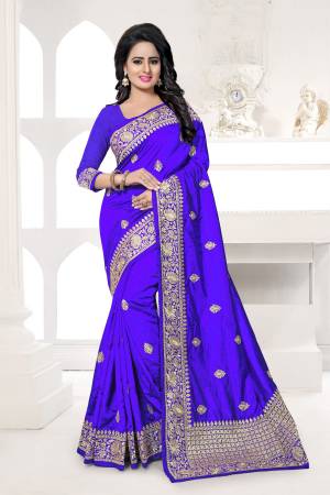 Attract All Wearing This Saree In Violet Color Paired With Violet Colored Blouse. This Saree And Blouse Are Fabricted On Art Silk Beautified With Heavy Jari Work. 