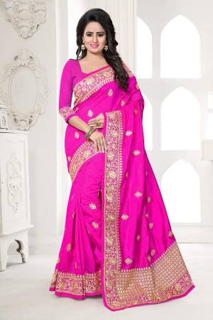 Bright And Visually Appealing Color Is Here With This Designer Saree In Rani Pink Color Paired With Rani Pink Colored Blouse. This Saree And Blouse Are Fabricated On Art Silk Beautified With Jari Embroidery Work. Buy This Saree Now.