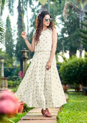 Simple And Elegant Looking Designer Readymade Kurti Is Here In Off-White Color Fabricated On Georgette Beautified With Simple Prints All Over It. This Pretty Kurti Is Light In Weight And Easy To Carry All Day Long. 