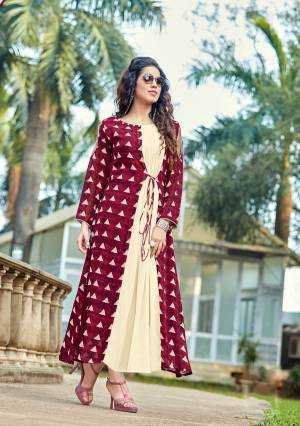 Grab This Beautiful Designer Readymade Kurti In Maroon and Cream Color Fabricated On Georgette. This Jacket Patterned Readymade Kurti Ensures Superb Comfort And Will Definitely Earn You Lots Of Compliments From Onlookers.
