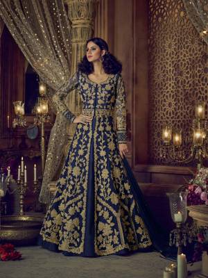 Enhance Your Personality Wearing This Designer Indo-Western Suit In Navy Blue Color Paired With Navy Blue Colored Bottom And Dupatta. Its Top And Dupatta Are Fabricated On Net paired With Art Silk Fabricated Pants and Lehenga. Its Top Is Beautified With Heavy Embroidery All Over. Buy This Suit Now.
