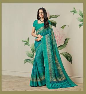 Grab This Pretty Saree In Sea Green Color Paired With Sea Green Colored Blouse. This Saree Is Fabricated On Jute Art Silk Paired With Art Silk Fabricated Blouse. It Is Light In Weight And Easy To Drape. Buy This Saree Now.