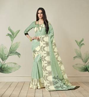 This Season Is About Subtle Shades And Pastel Play, So Grab This Saree In Pastel Green Color Paired With Pastel Green Colored Blouse. This Saree Is Fabricted On Jute Art Silk Paired With Art Silk Fabricated Blouse. It Has Prints Over The Saree Lace Border. Buy Now.