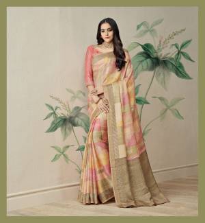 Look Pretty Wearing This Saree In Beige And Pink Color Paired With Pink Colored Blouse. This Saree Is Fabricated On Jute Art Silk Paired With Art Silk Fabricated Blouse. It Has Pretty Blacks Prints All Over The Saree. Buy This Saree Now.