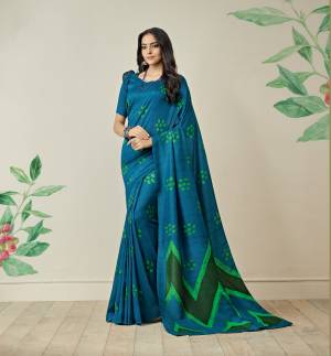 Add This Saree For Your Casual Wear In Blue Color Paired With Blue Colored Blouse, This Saree IS Fabricated On Jute Art Silk Paired With Art Silk Fabricated Blouse. It Is Light Weight And Easy To Drape. Buy This Saree Now.