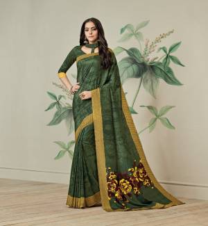 Add This Saree For Your Casual Wear In Dark Green Color Paired With Dark Green Colored Blouse, This Saree IS Fabricated On Jute Art Silk Paired With Art Silk Fabricated Blouse. It Is Light Weight And Easy To Drape. Buy This Saree Now.