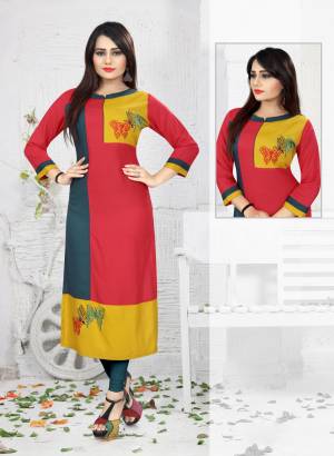 Grab This Readymade Designer Kurti With Color Block Theme. This Pretty Kurti Is In Dark Pink Color Fabricated On Rayon Beautified With Thread Work. This Kurti Is Light In Weight And Easy to Carry All Day Long.