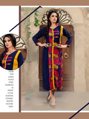 Enhance Your Perswonality Waring This Designer Readymade Kurti In Navy Blue Color Fabricated On Rayon. This Pretty Kurti Is Beautified With Prints And Is Light In Weight Which Is Comfortable To Carry Throughout The Day.  Buy It Now.