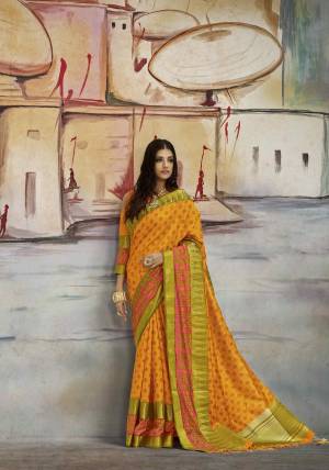 Celebrate This Festive Season Wearing This Bright Saree In Musturd Yellow Color Paired With Musturd Yellow Colored Blouse. This Saree Is Fabricated On Nylon Art Silk Paired With Brocade Fabricated Blouse. It Is Easy To Drape And durable.