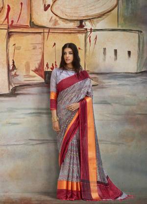 You Will Definitely Earn Lots Of Compliments Wearing This Rich And Elegant Looking Saree In Grey Color Pired With Grey Colored Blouse. This Is Fabricated On Nylon Art Silk Paired With Brocade Fabricated Blouse. Buy This Saree Now.