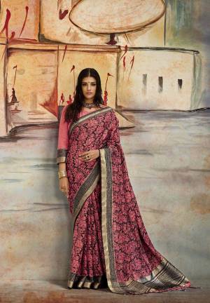 A Must Have Shade In Every Womens Wardrobe Is Here With This Saree In Dusty Pink Color Paired With Dusty Pink Colored Blouse. This Saree Is Fabricated On Nylon Art Silk Paired With Brocade Fabricated Blouse. Buy This Saree Now.