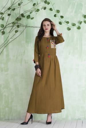 Add This Lovely Shade To Your Wardrobe In Olive Green Colored Readymade Designer Kurti Fabricated On Cotton. This Kurti Is Light Weight And It Will Definitely Earn You Lots Of Compliments From Onlookers.