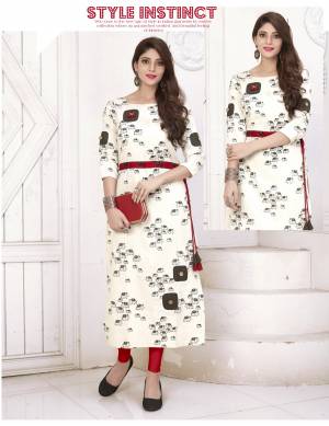 Here Is Lovely, simple And elegant Looking Designer Readymade Kurti Is Here In Off-White Color Fabricated On Cotton Beautified With Small Elphant Prints All Over. ThisKurti Is Light Weight And Also It Comes With A Belt Which Makes The Kurti More Graceful.