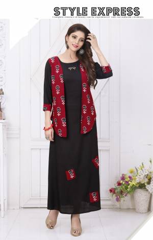 For A Bold And Beautiful Look, Grab This Designer Readymade Kurti In Black And Maroon Color Fabricated On Cotton. This Pretty Kurti Has Lovely Maroon Colored Koti Which You Can Pair As Per Your Occasion. Buy It Now.