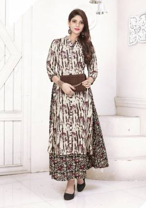 Add This Double Layered Readymade Kurti In Off-White And Brown Color Fabricated On Cotton Beautified With Prints. This Simple And Elegant Combination Is Forever and You Can Wear It As Semi-Casual Wear Or Social Gatherings.