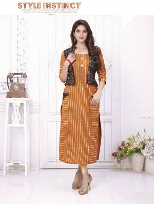 Be It Your Casual Or Semi-Casual Wear, Grab This Pretty Kurti In Orange Color Fabricated On Cotton. This Readymade Kurti Also Comes With A Koti Which You Can Pair As Per The Occasion. Buy It Now.