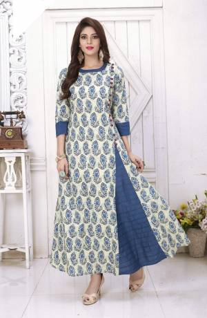 Simple Kurti Is Here In White And Blue Color Fabricated On Cotton. This Readymade Kurti Has Lovely Flair And Beautified With Prints All Over It. This Kurti Is Light Weight And Easy To Carry All Day Long.