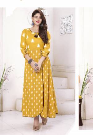 Celebrate This Festive Season With Beauty And Comfort Wearing This Readymade Kurti In Musturd Yellow Color Fabricated On Cotton. This Kurti Has Simple Prints All Over It. Pair Thi Up With Yellow Or White Colored Leggings And Complete The Look.