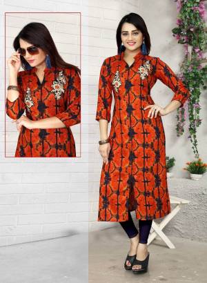For Your Regular Wear, Grab This Pretty Kurti In Orange Color Fabricated On Rayon Beautified With Prints And Embroidered Patch Work. This Kurti Is Light Weight And Easy To Carry All Day Long.